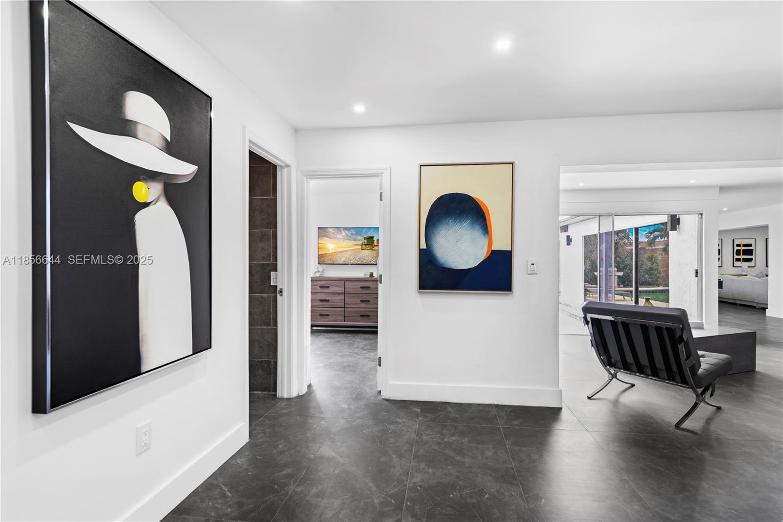 4322 Polk Street Hollywood, FL 33021 - Photo 30 of 43 a living room with furniture and wooden floor