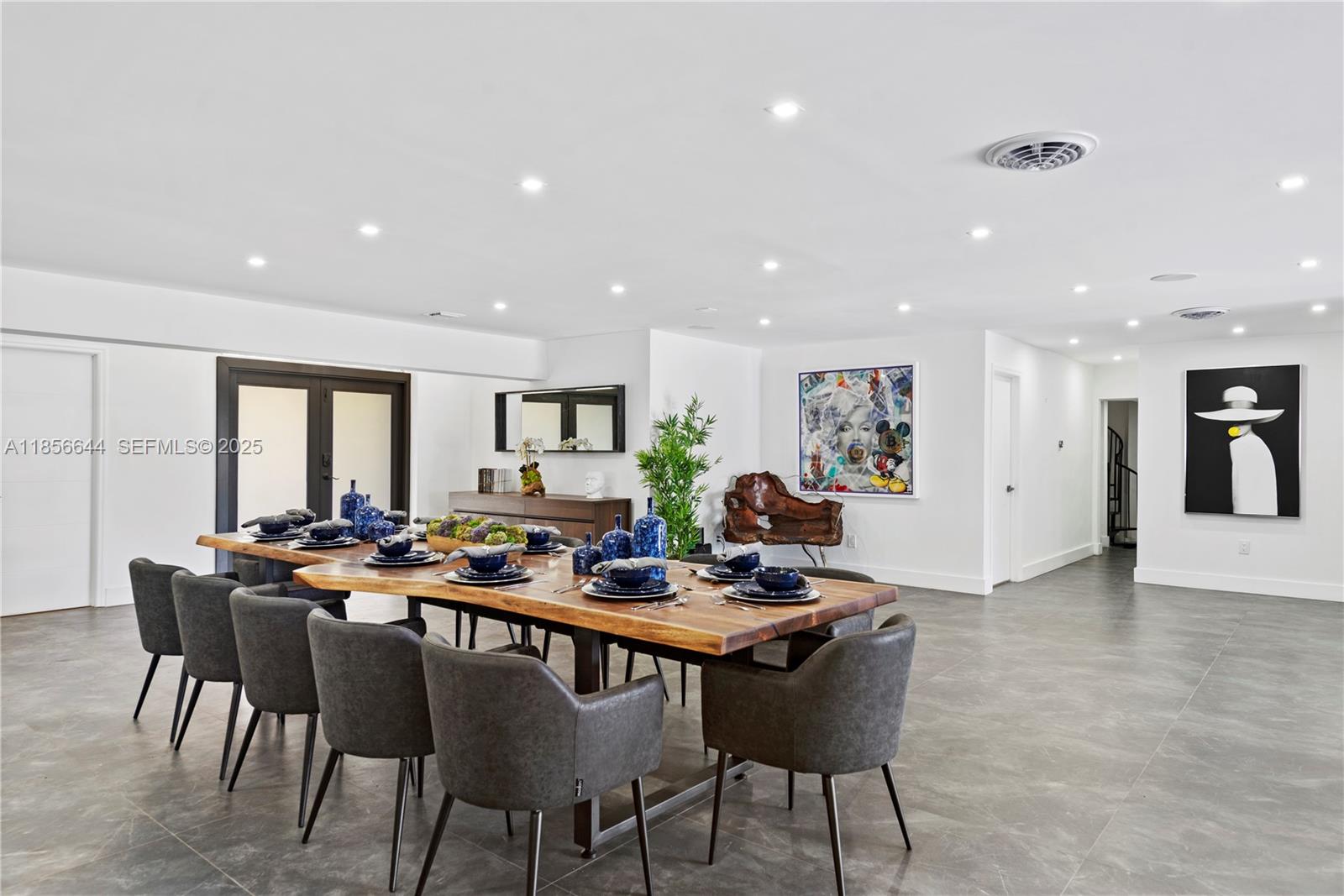 4322 Polk Street Hollywood, FL 33021 - Photo 3 of 43 a view of a dining room with furniture window and wooden floor