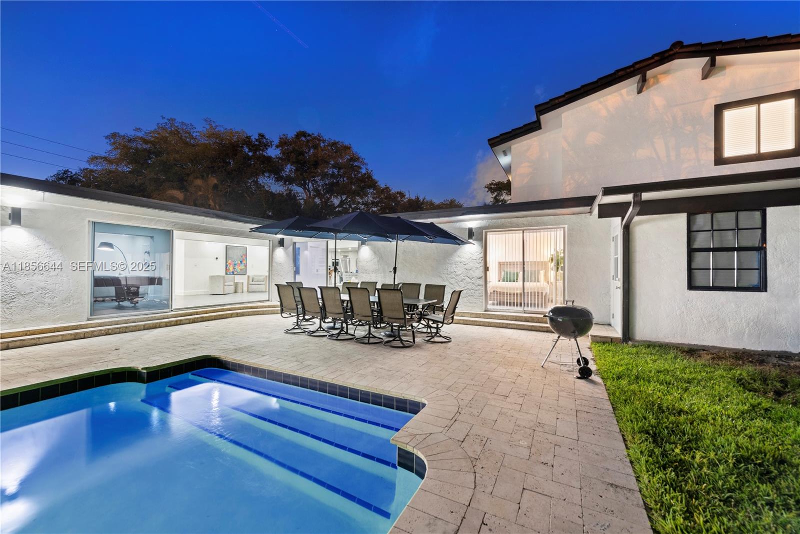 4322 Polk Street Hollywood, FL 33021 - Photo 40 of 43 a view of swimming pool with outdoor seating