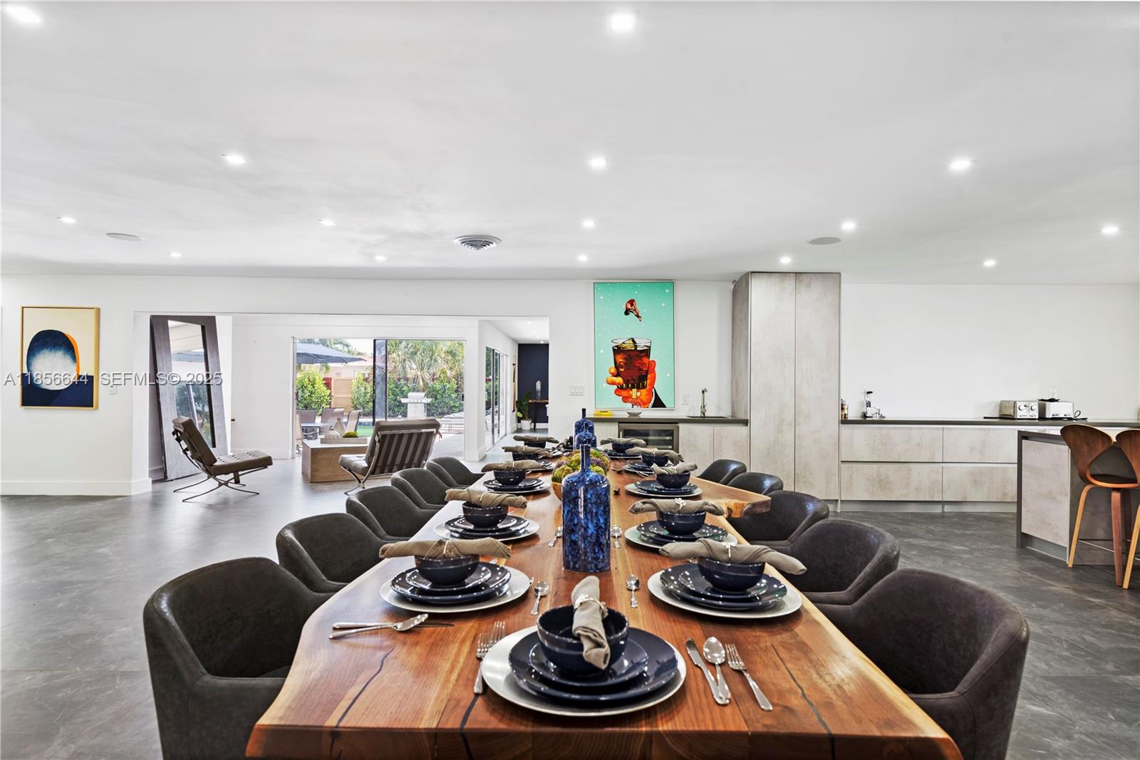 4322 Polk Street Hollywood, FL 33021 - Photo 6 of 43 a living room with furniture and a wooden floor