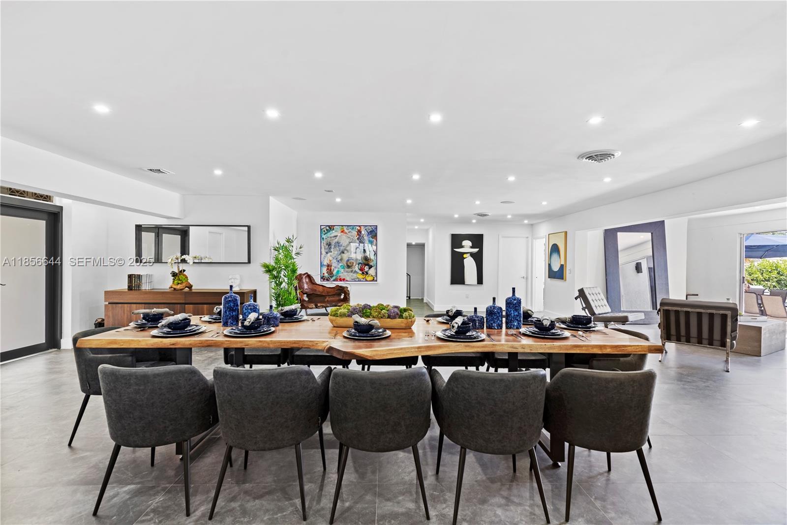 4322 Polk Street Hollywood, FL 33021 - Photo 7 of 43 a view of a dining room and chairs in a room