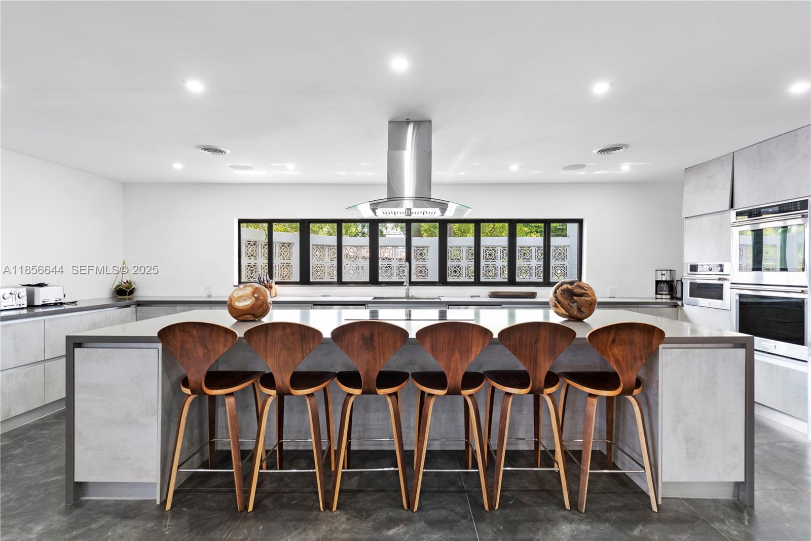 4322 Polk Street Hollywood, FL 33021 - Photo 8 of 43 a view of kitchen with breakfast area and windows