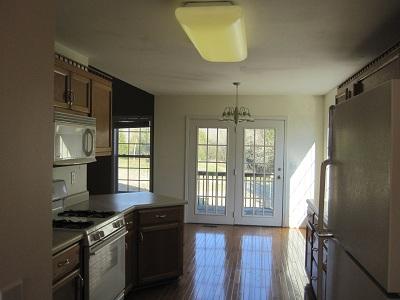 2014 Lakeview Road Spring Hill, TN 37174 - Photo 7 of 19 Kitchen showing view to patio door, leading onto back of property and deck areas.