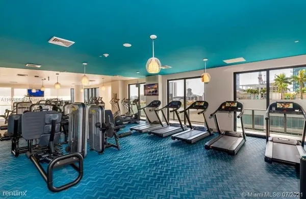 a view of a room with gym equipment