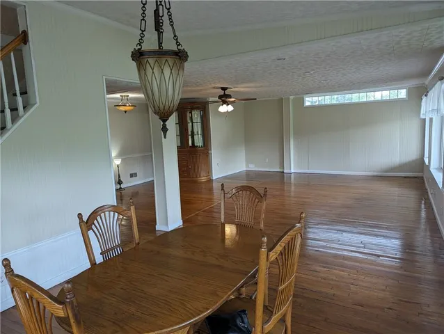 a view of a dining room with furniture