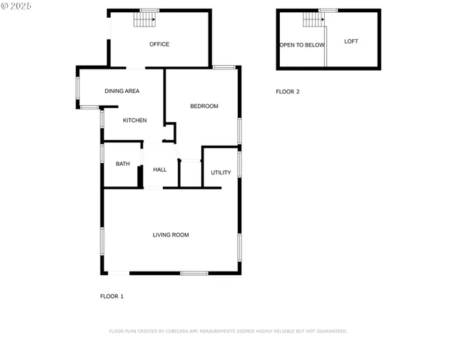 a picture of a wall with a white building