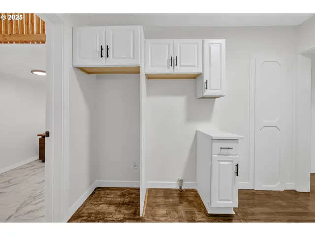 a view of kitchen and hardwood