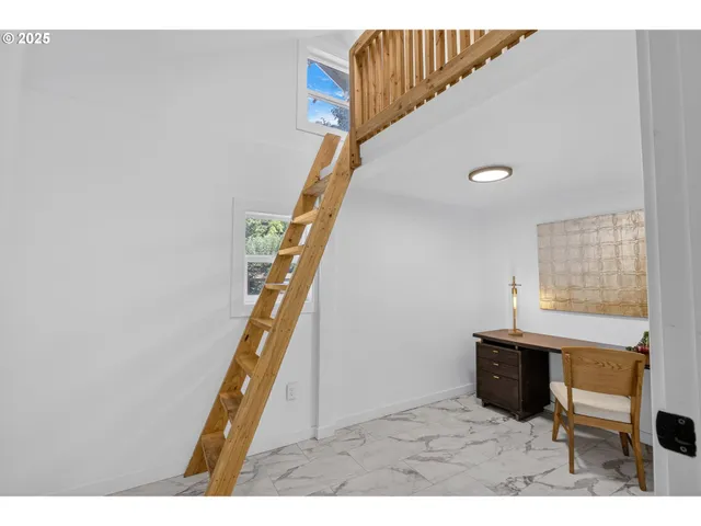 a view of entryway with stairs