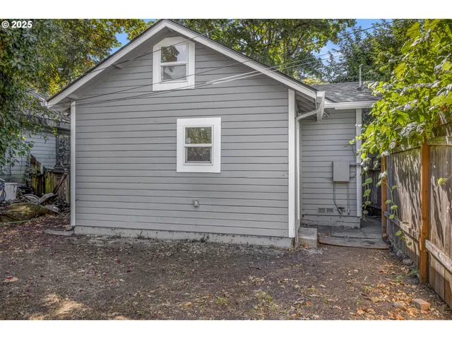 a view of a backyard of a house