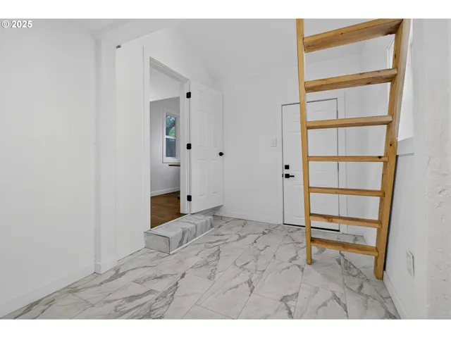 a view of a back yard of the house