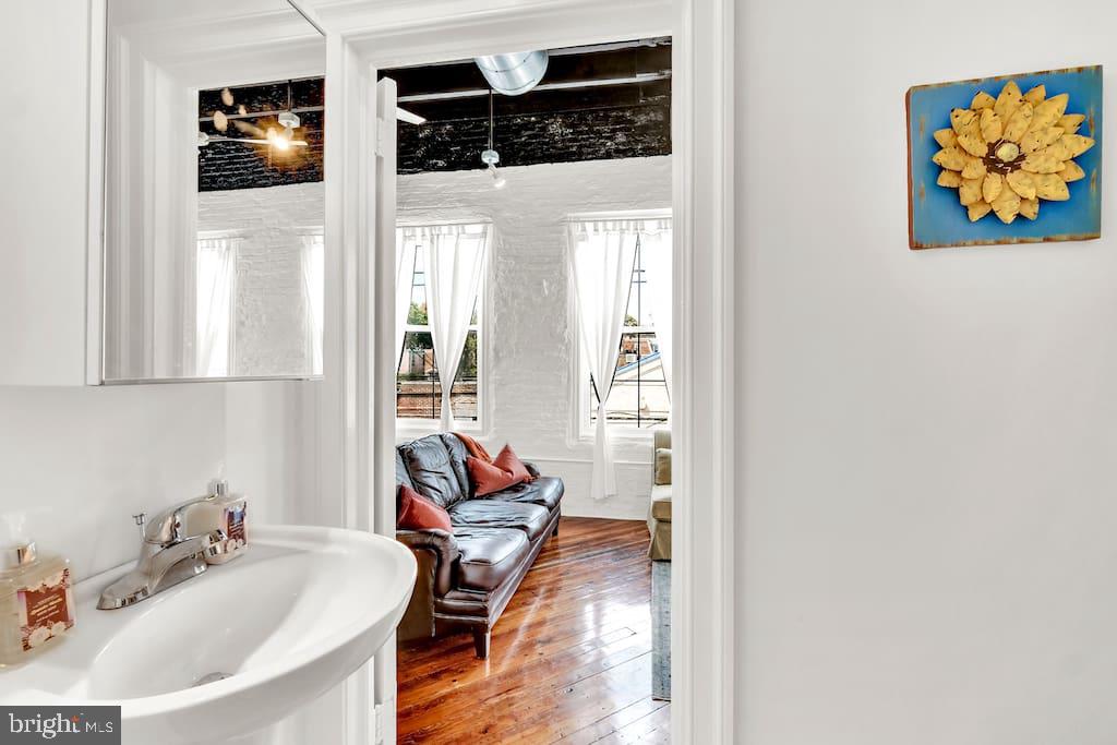 216 West Rittenhouse Street Philadelphia, PA 19144 - Photo 9 of 9 a en suite bathroom with a sink and a mirror