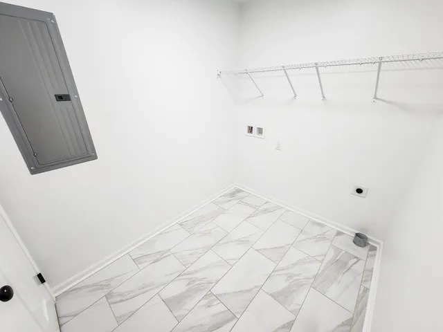 a view of a room with racks on the wall