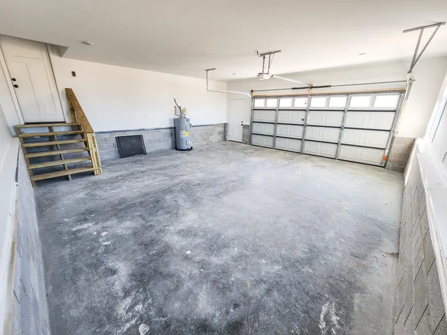a view of a livingroom with stairs