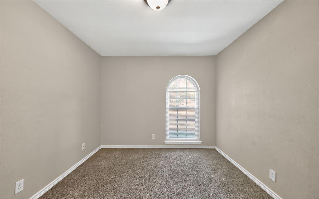 220 Short Street Burleson, TX 76028 - Photo 26 of 36 an empty room with windows