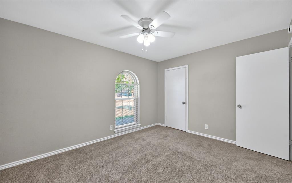 220 Short Street Burleson, TX 76028 - Photo 28 of 36 an empty room with fan and windows