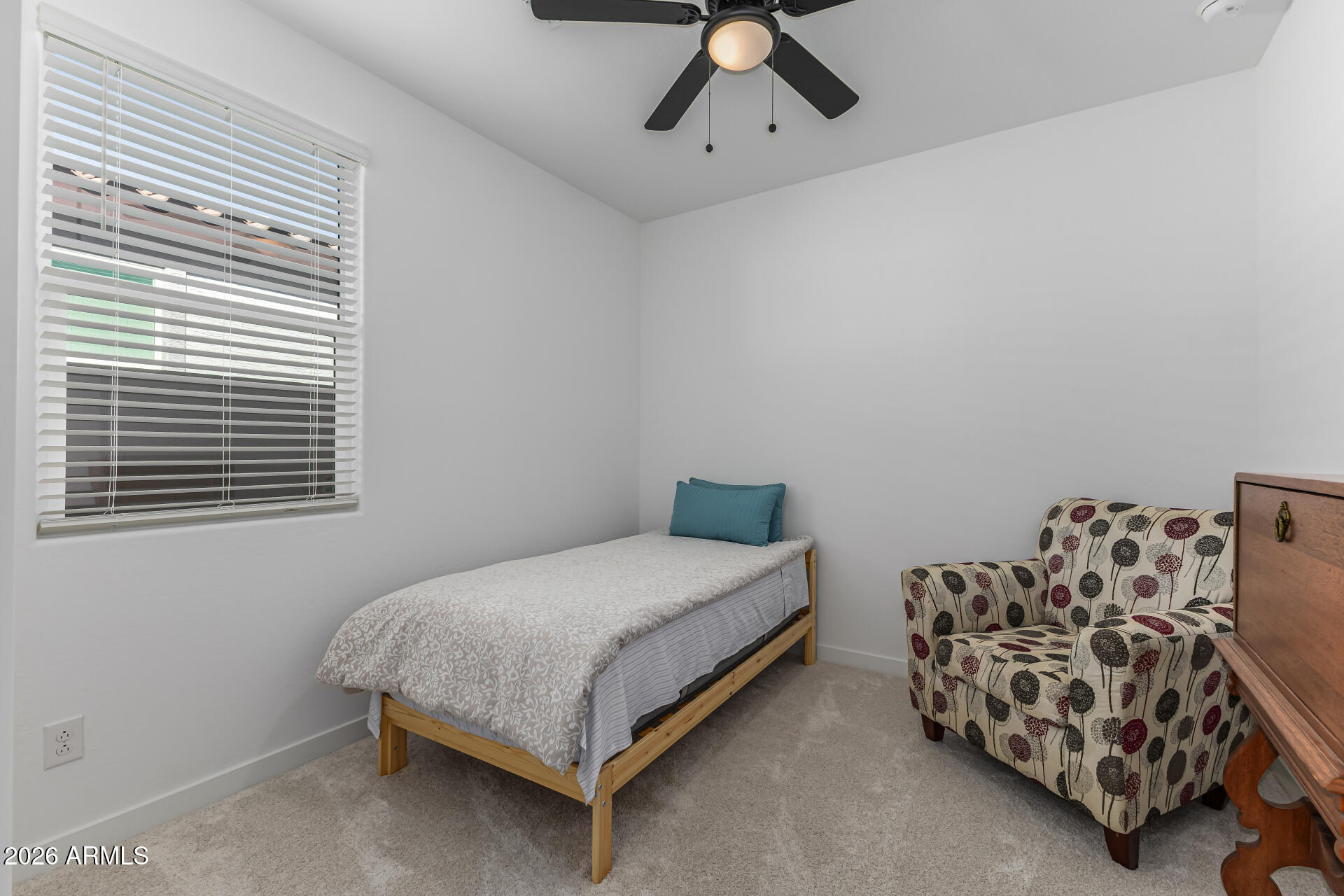 3347 South 156th Avenue Goodyear, AZ 85338 - Photo 24 of 50 a bedroom with a bed and a window