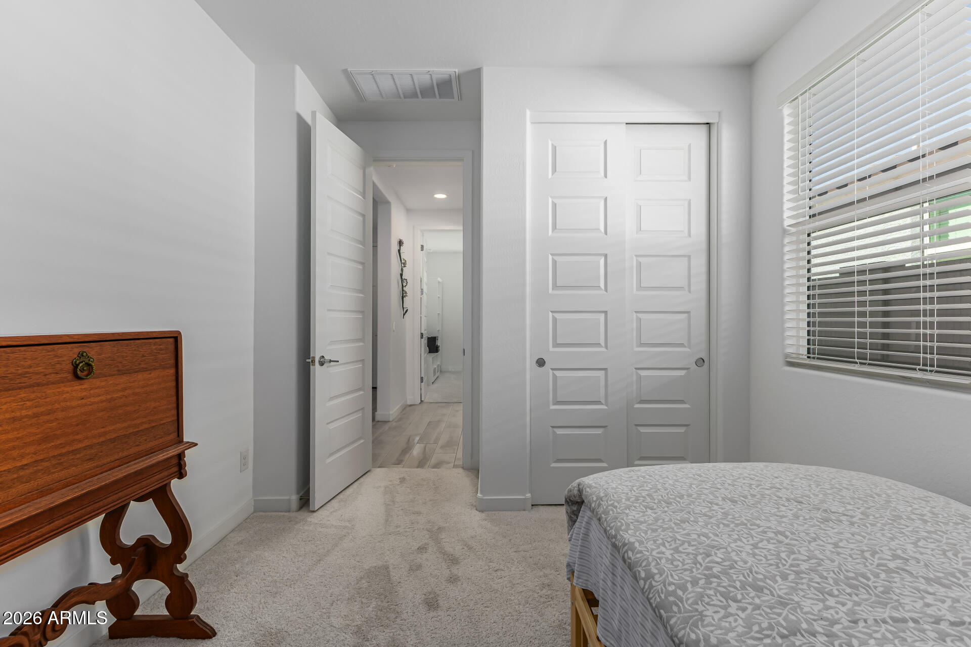 3347 South 156th Avenue Goodyear, AZ 85338 - Photo 25 of 50 a bedroom with a bed and a dresser