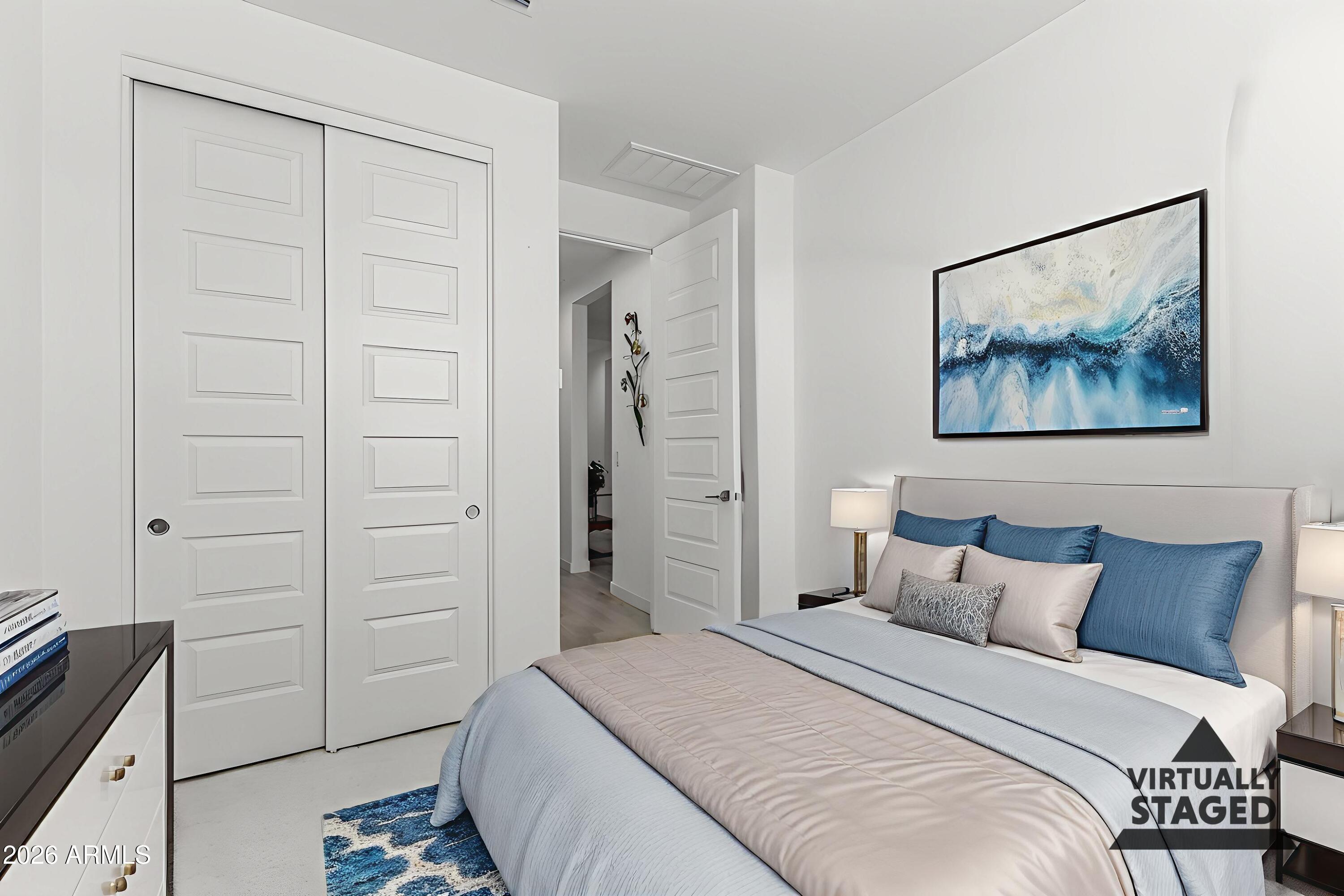 3347 South 156th Avenue Goodyear, AZ 85338 - Photo 29 of 50 a bedroom with a bed and furniture