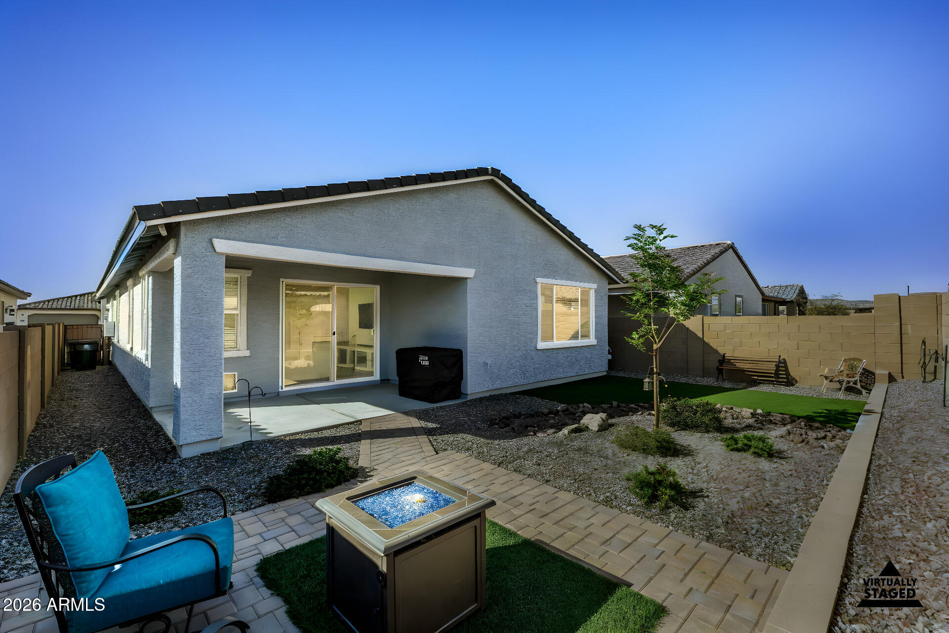 3347 South 156th Avenue Goodyear, AZ 85338 - Photo 41 of 50 a front view of a house with garden