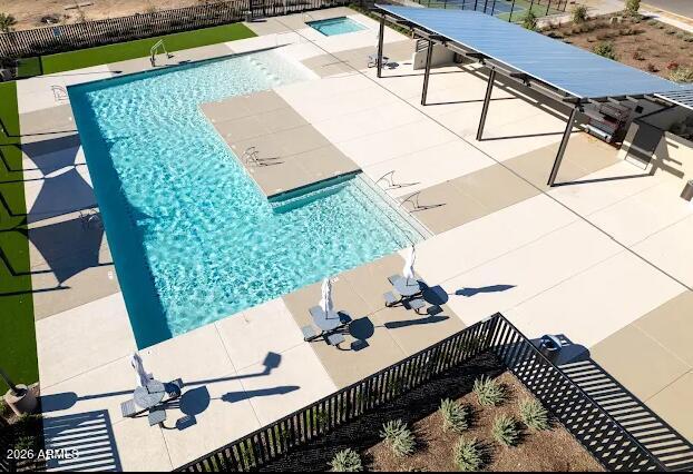 3347 South 156th Avenue Goodyear, AZ 85338 - Photo 46 of 50 a view of a terrace with furniture and wooden floor