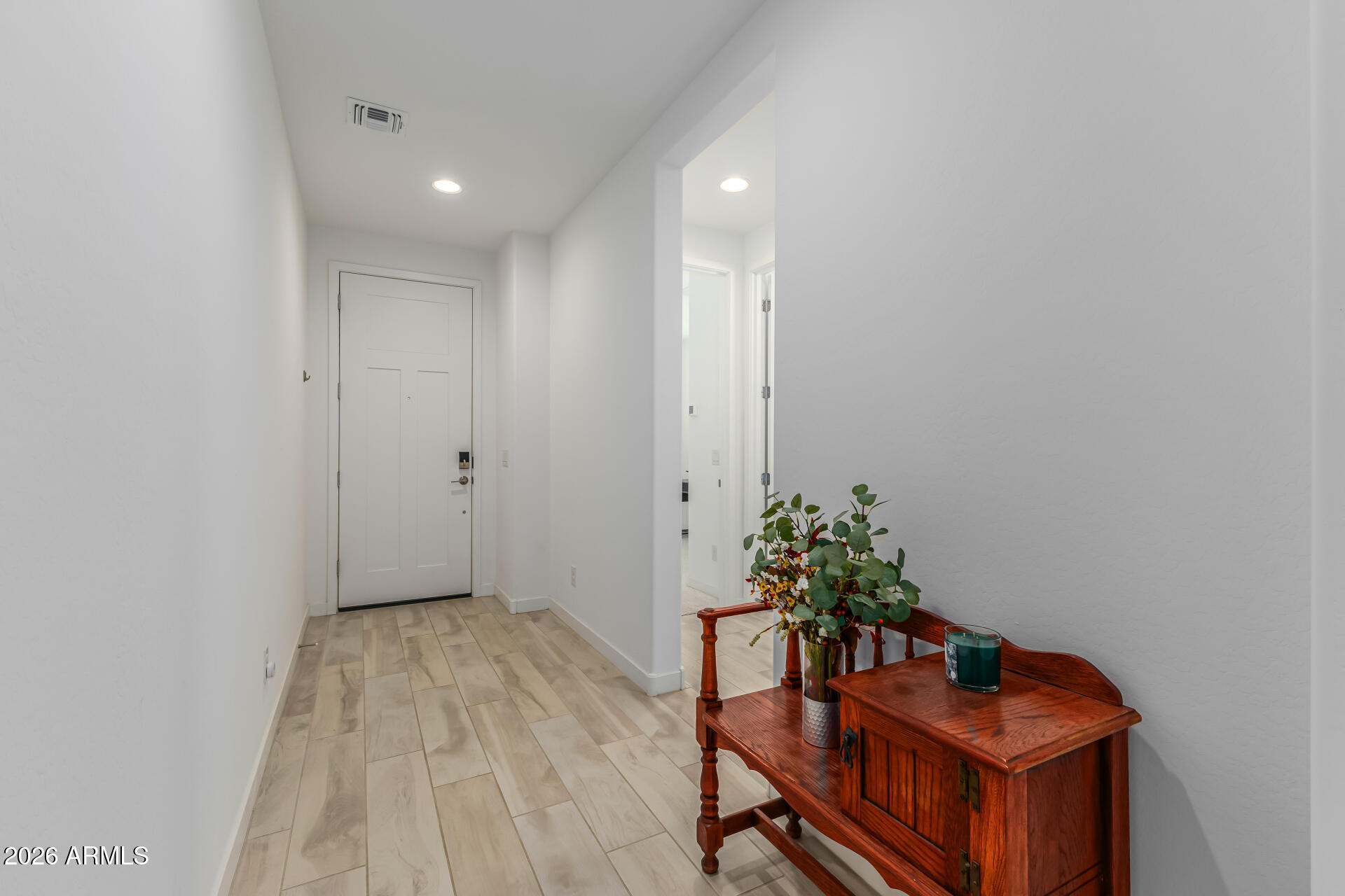 3347 South 156th Avenue Goodyear, AZ 85338 - Photo 5 of 50 a room with furniture and wooden floor