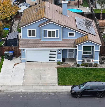 a car parked in front of a house
