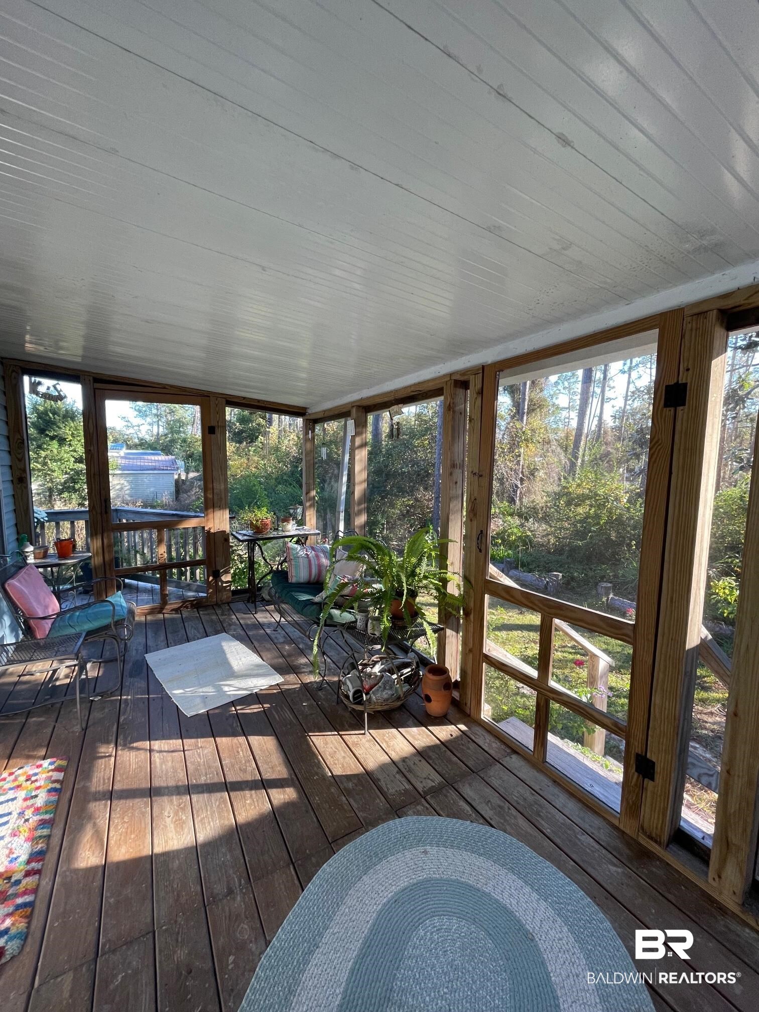 1395 Ridgewood Drive Lillian, AL 36549 - Photo 13 of 39 Screened Porch