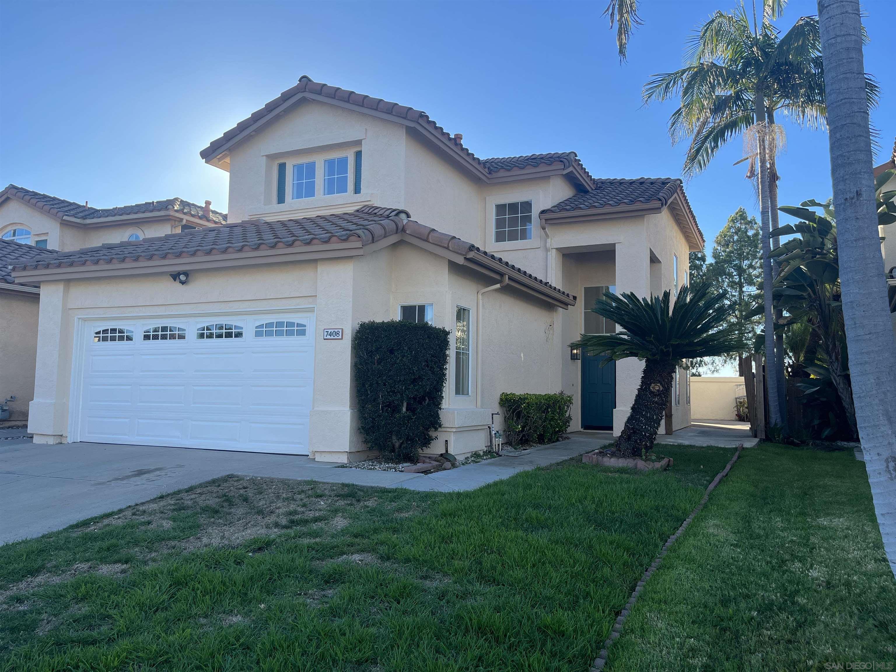 7408 Sean Taylor Lane San Diego, CA 92126 - Photo 1 of 29 a view of a house with a yard