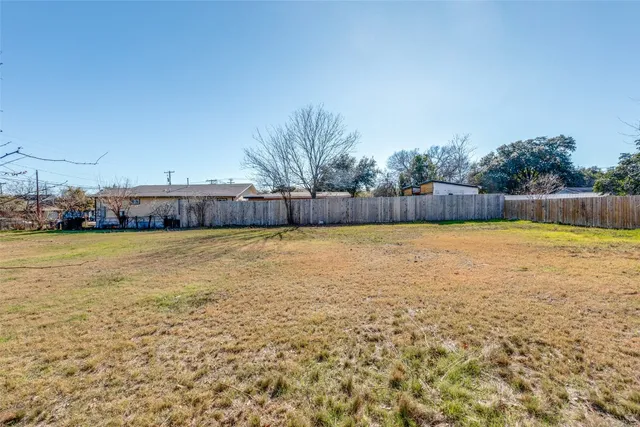 a view of a swimming pool and an outdoor space