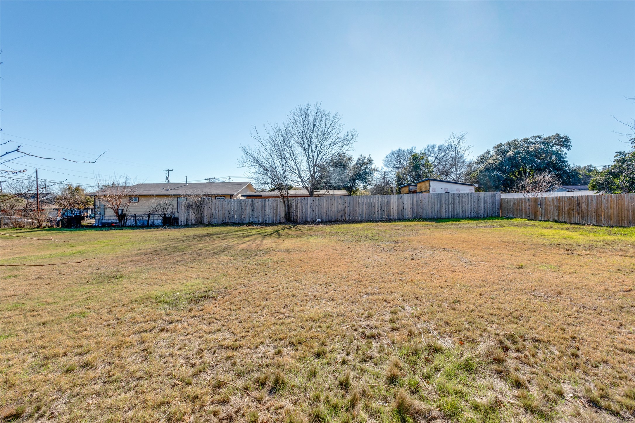 6910 Blessing Avenue Austin, TX 78752 - Photo 12 of 13 a view of a swimming pool with an outdoor space and seating area