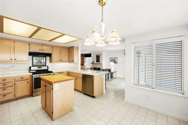 a bathroom with a double vanity sink mirror and shower