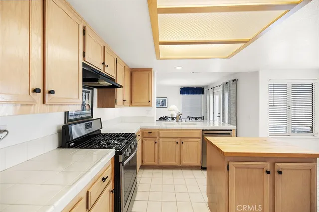 a bathroom with a toilet a sink and a mirror