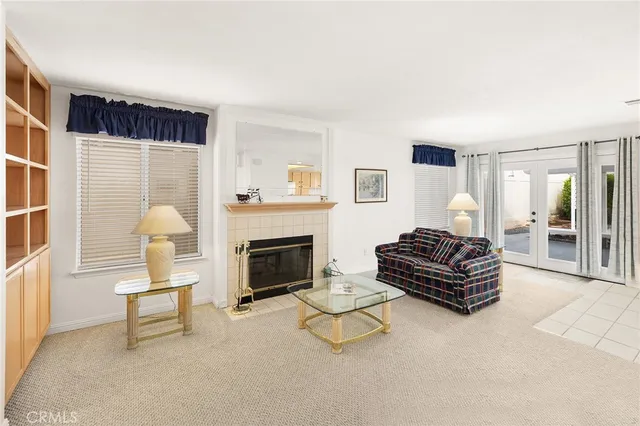 a view of a house with backyard and porch