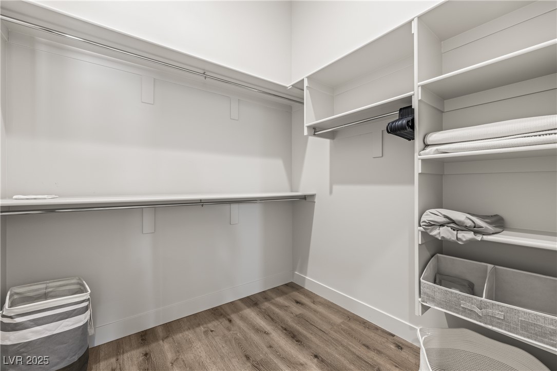 1357 Manassas Ridge Mesquite, NV 89027 - Photo 22 of 72 Walk in closet featuring wood finished floors