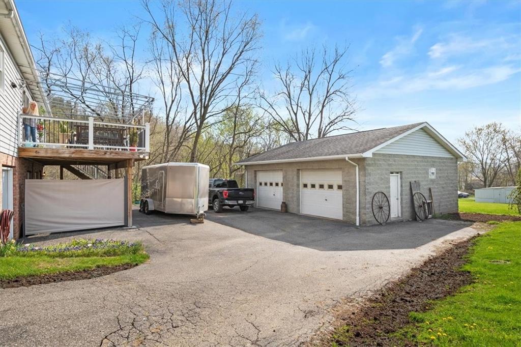56 Price Road Presto, PA 15142 - Photo 22 of 25 Plenty of parking here! Did I mention the oversized garage doors?? You can fit a boat in there...