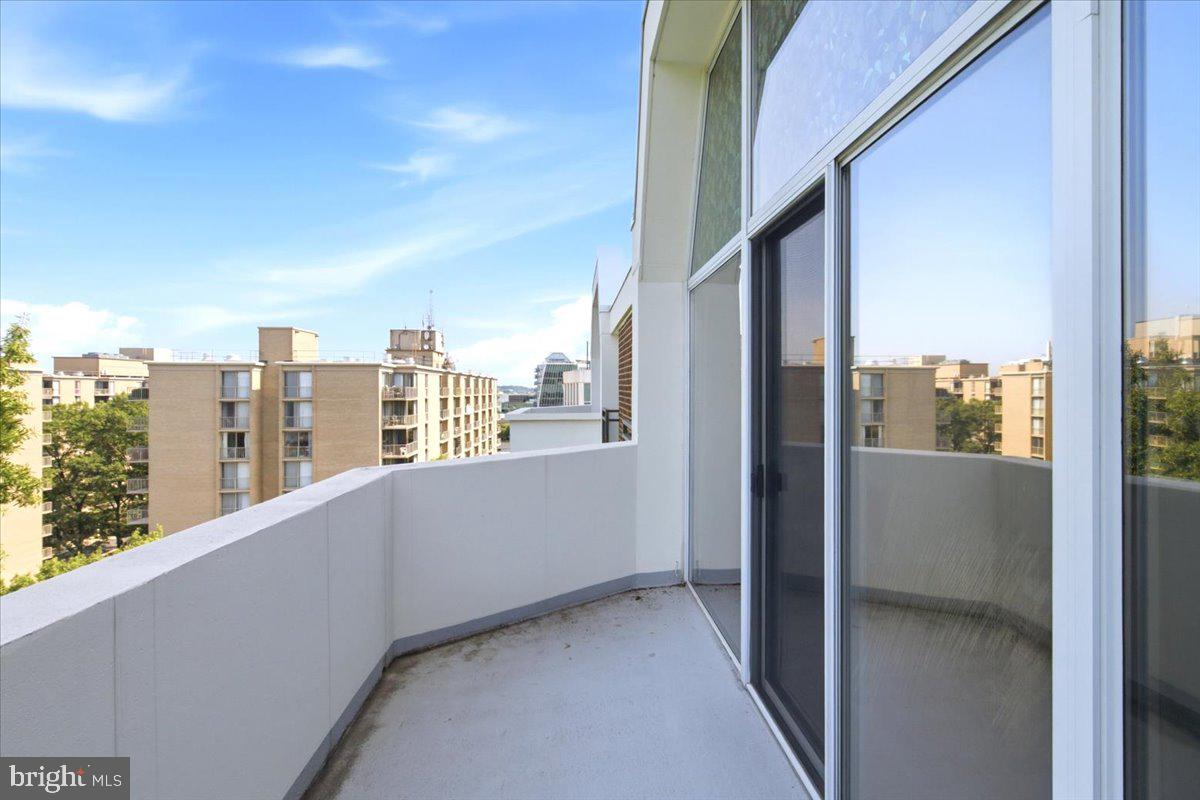 700 7th Street Southwest, Unit 827 Washington, DC 20024 - Photo 10 of 32 Sunny balcony with city views.