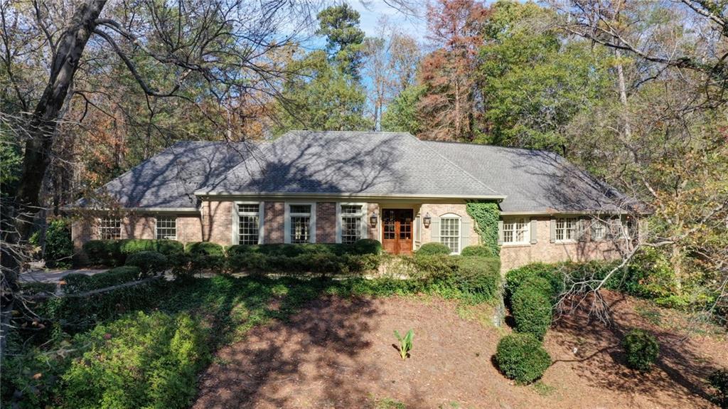 1617 Musket Ridge Northwest Atlanta, GA 30327 - Photo 1 of 1 a view of house with garden