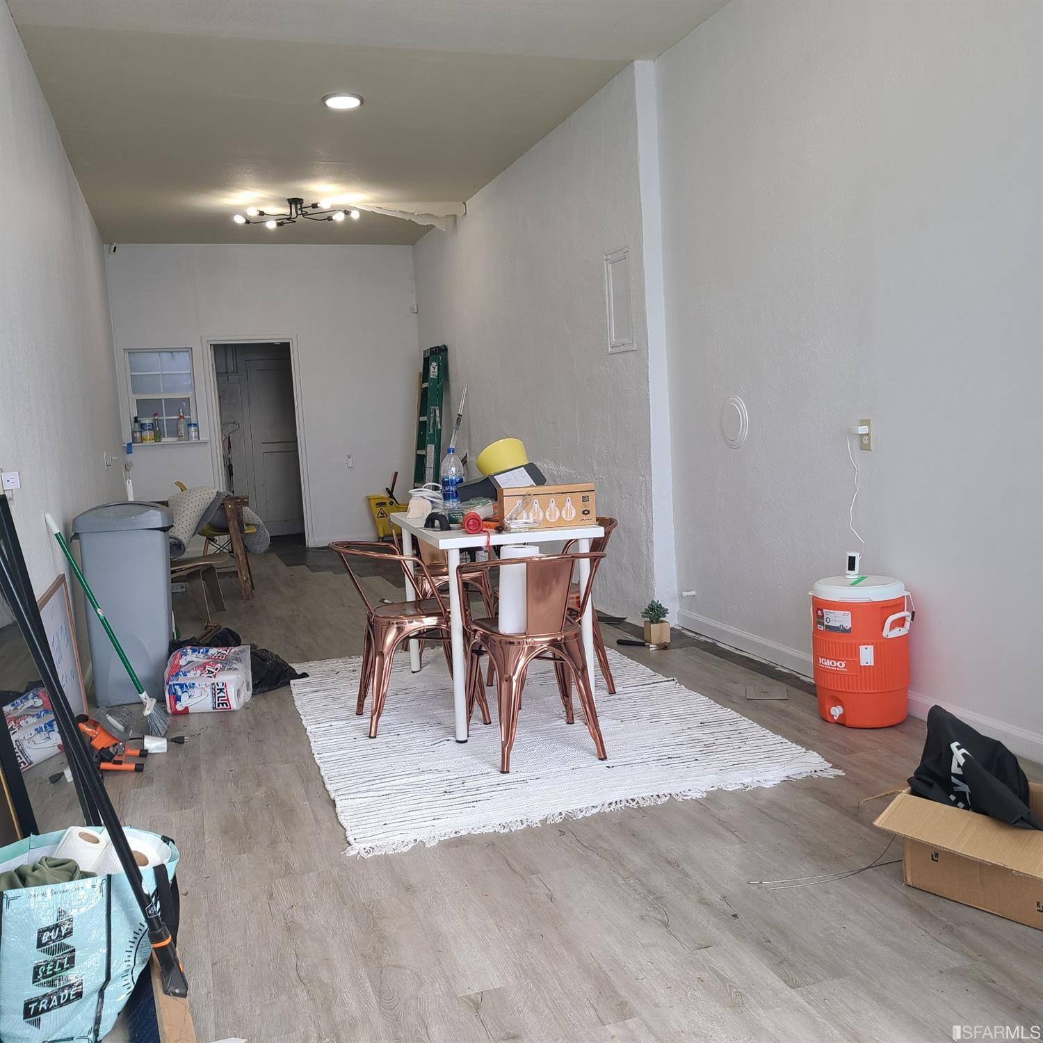 7960 MacArthur Boulevard Oakland, CA 94605 - Photo 6 of 10 a view of a dining room with furniture and a wooden floor
