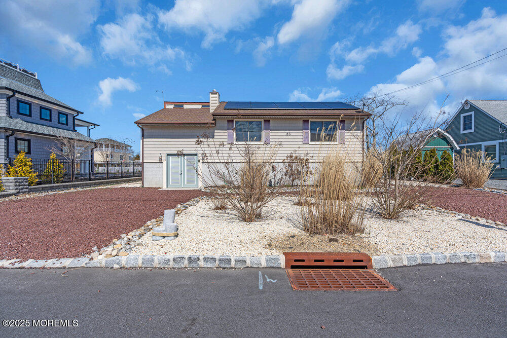 23 Bayview Drive Waretown, NJ 08758 - Photo 1 of 67 a view of a house with a snow in the yard