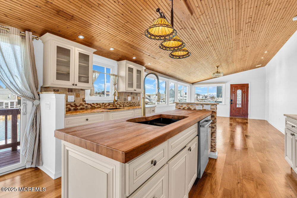 23 Bayview Drive Waretown, NJ 08758 - Photo 15 of 67 a kitchen with a stove and a sink