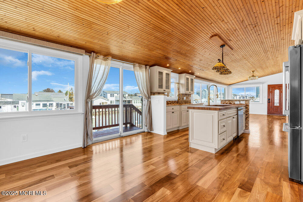 23 Bayview Drive Waretown, NJ 08758 - Photo 24 of 67 a view of a kitchen with wooden floor