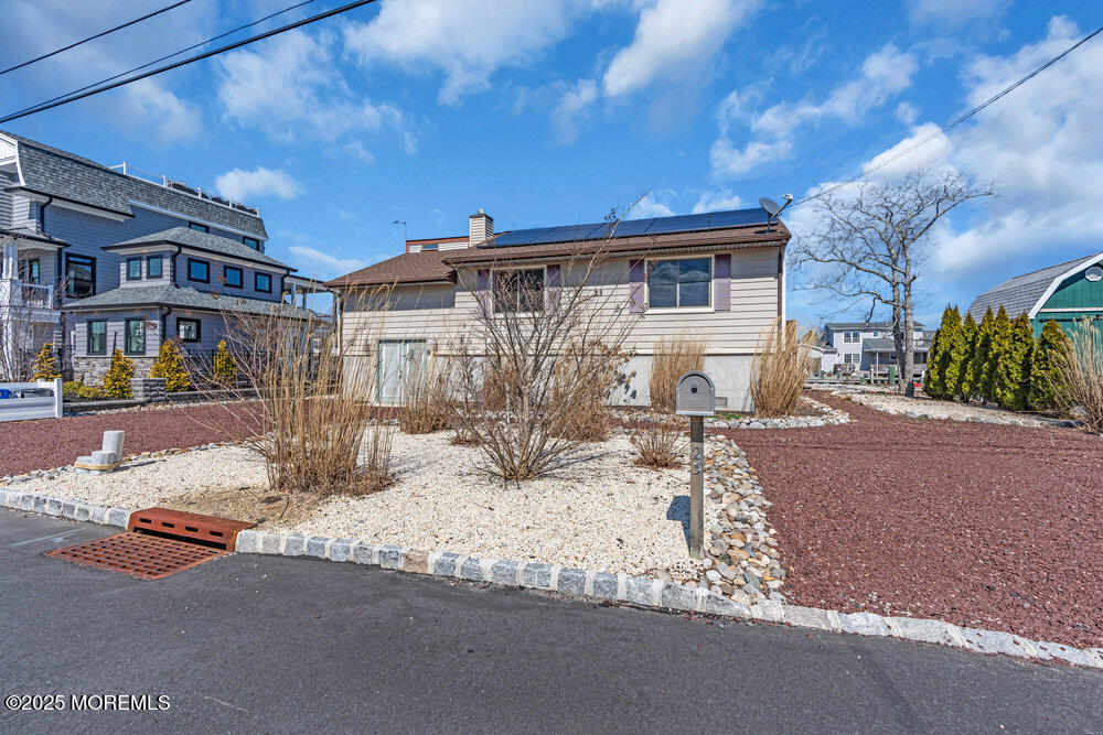 23 Bayview Drive Waretown, NJ 08758 - Photo 3 of 67 a view of a house with snow on the road