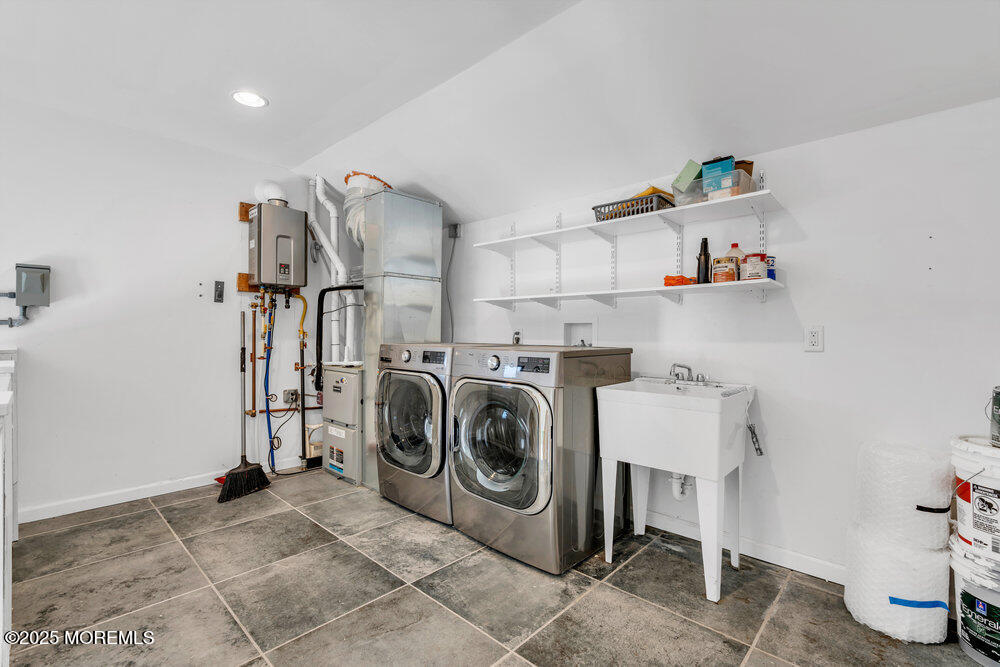 23 Bayview Drive Waretown, NJ 08758 - Photo 42 of 67 a utility room with dryer washer and a view of living room