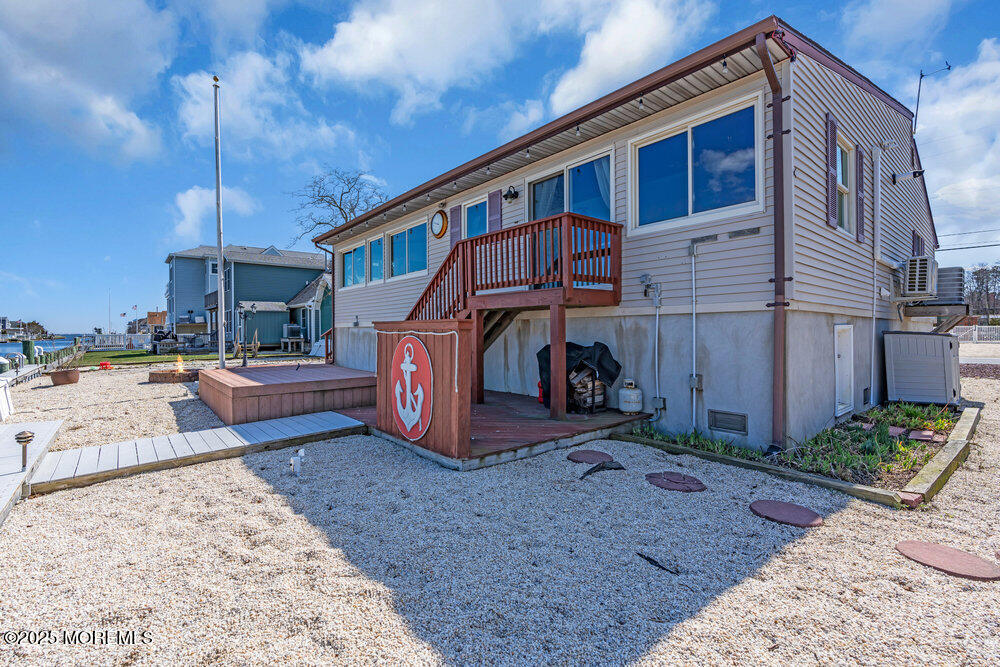 23 Bayview Drive Waretown, NJ 08758 - Photo 50 of 67 a view of a house with a patio