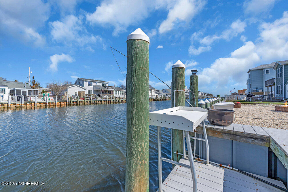 23 Bayview Drive Waretown, NJ 08758 - Photo 54 of 67 a view of a lake with a terrace