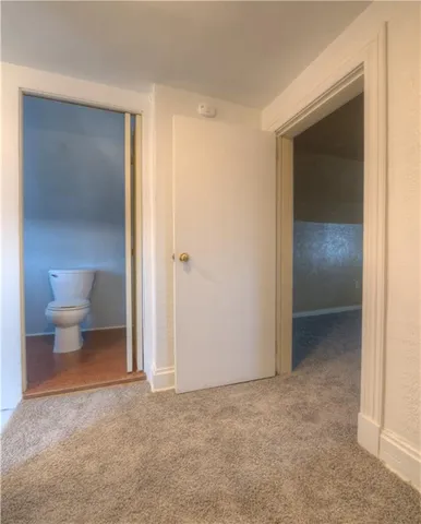 a bathroom with a toilet