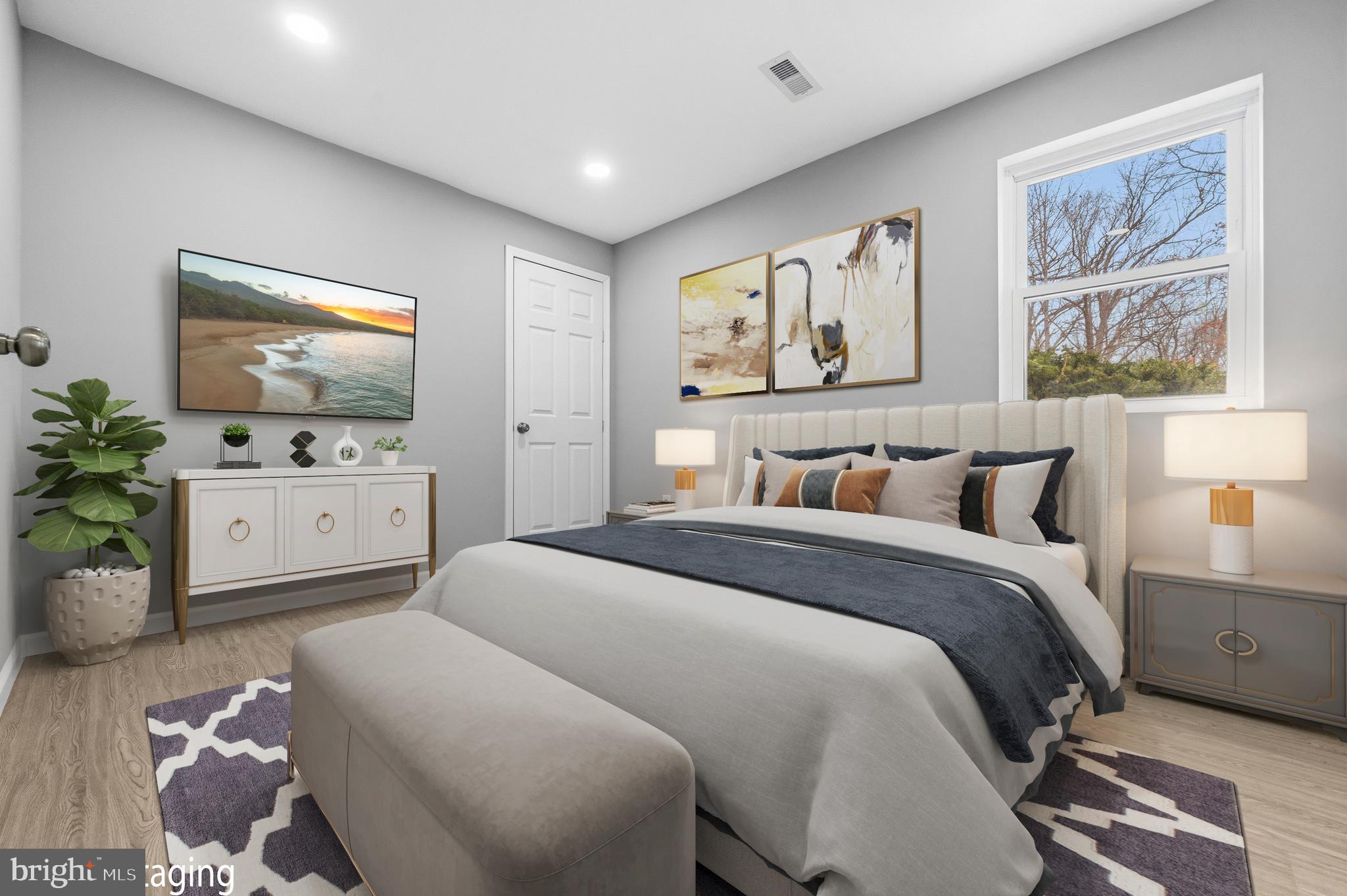 3720 Mt Pleasant Road Waldorf, MD 20601 - Photo 17 of 31 a bedroom with a bed and a couch