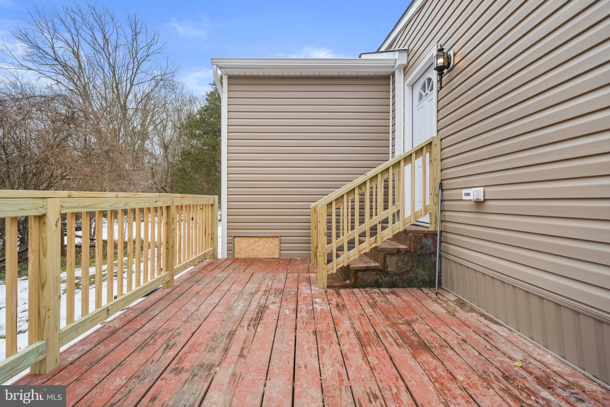 3720 Mt Pleasant Road Waldorf, MD 20601 - Photo 26 of 31 a view of a wooden deck with a yard