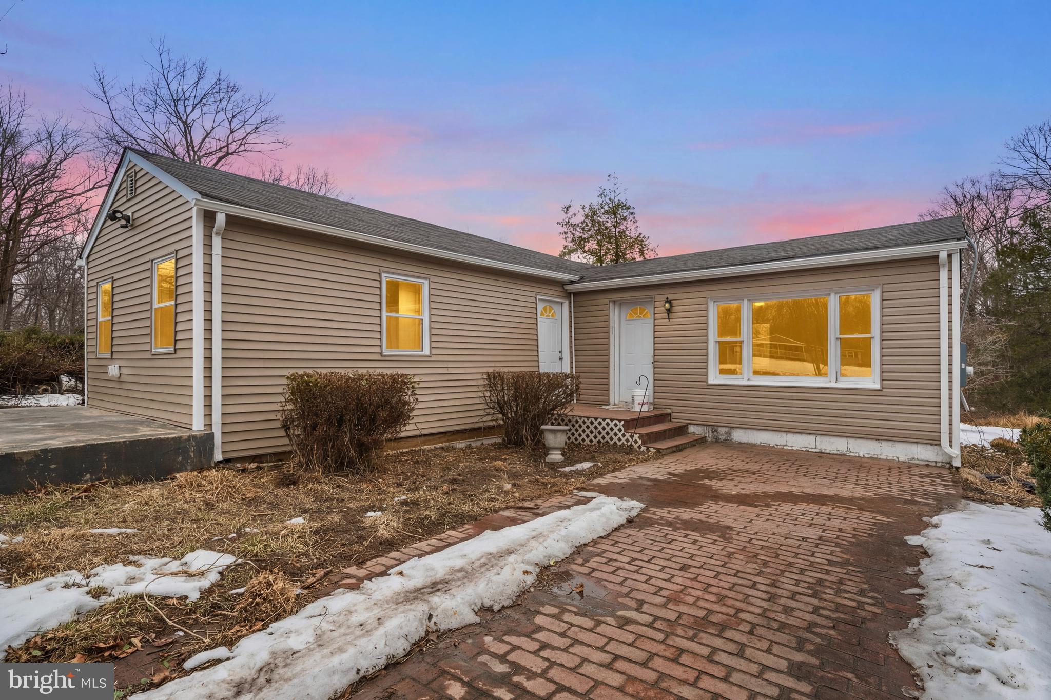 3720 Mt Pleasant Road Waldorf, MD 20601 - Photo 30 of 31 a backyard of a house with yard and outdoor seating