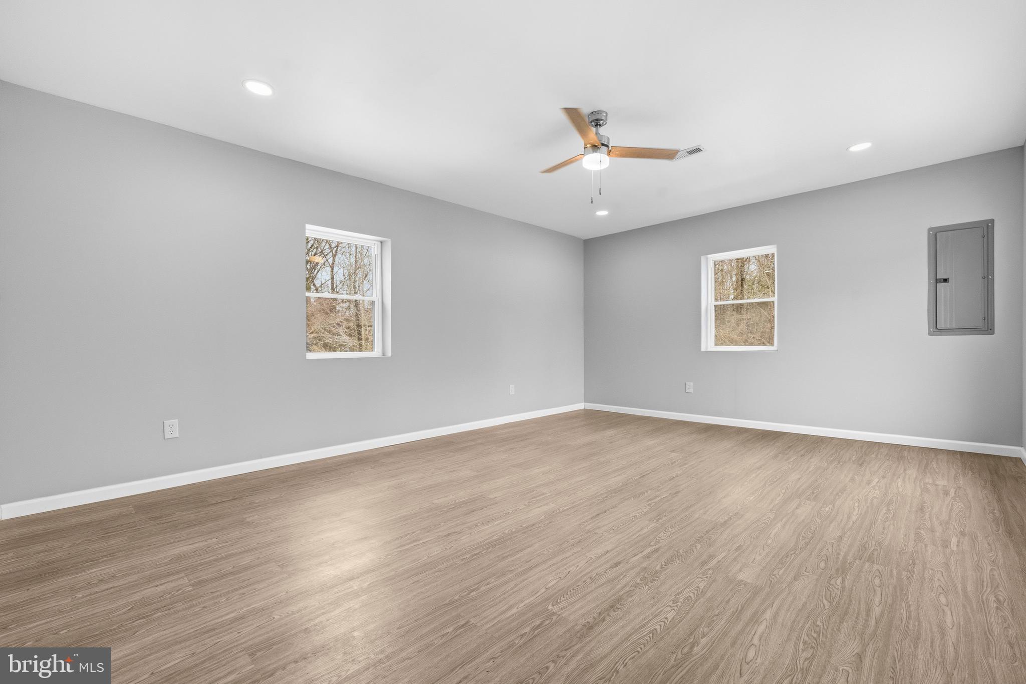 3720 Mt Pleasant Road Waldorf, MD 20601 - Photo 4 of 31 a view of an empty room with wooden floor and a window